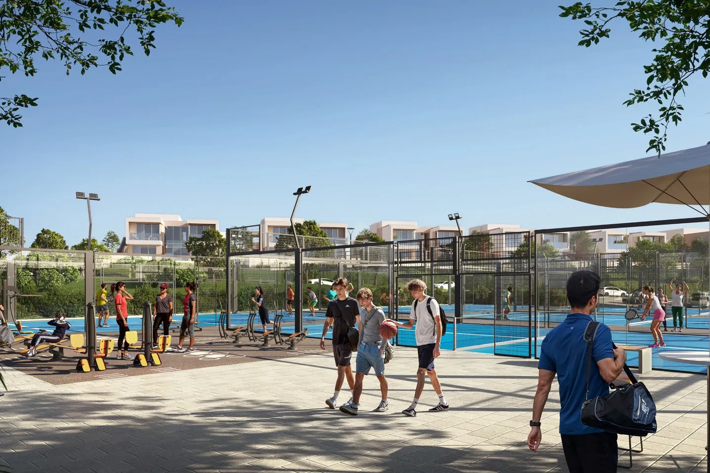 Padel courts and outdoor gym equipment at the sports hub