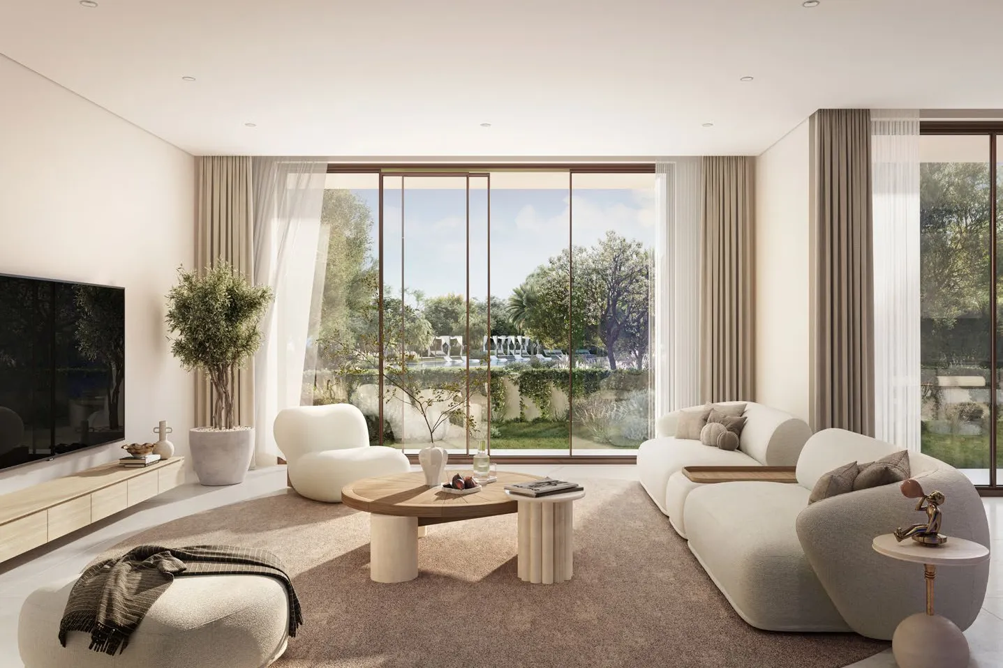 Bright living room with tall glass doors onto the garden